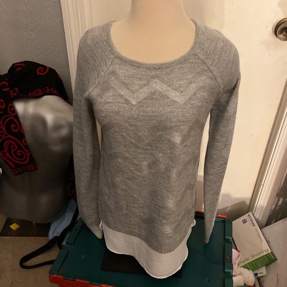 AB Studio gray long sweater with sparkly threads and has a white shear below M